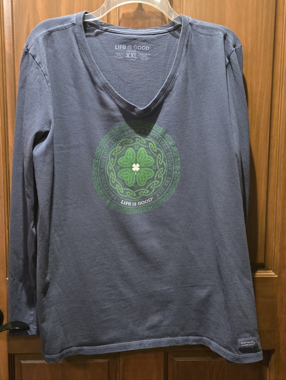 Life Is Good Women's Long Sleeve V-Neck Tee in Navy with Green Celtic Graphic